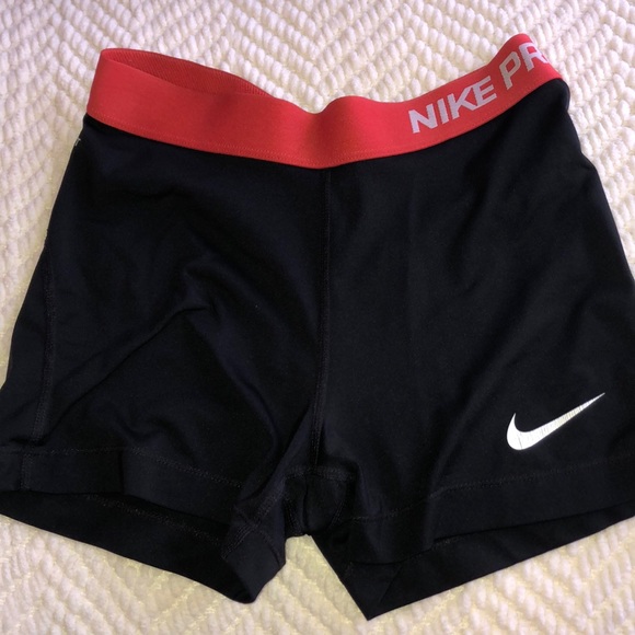 Black Nike Pros With Red Band 